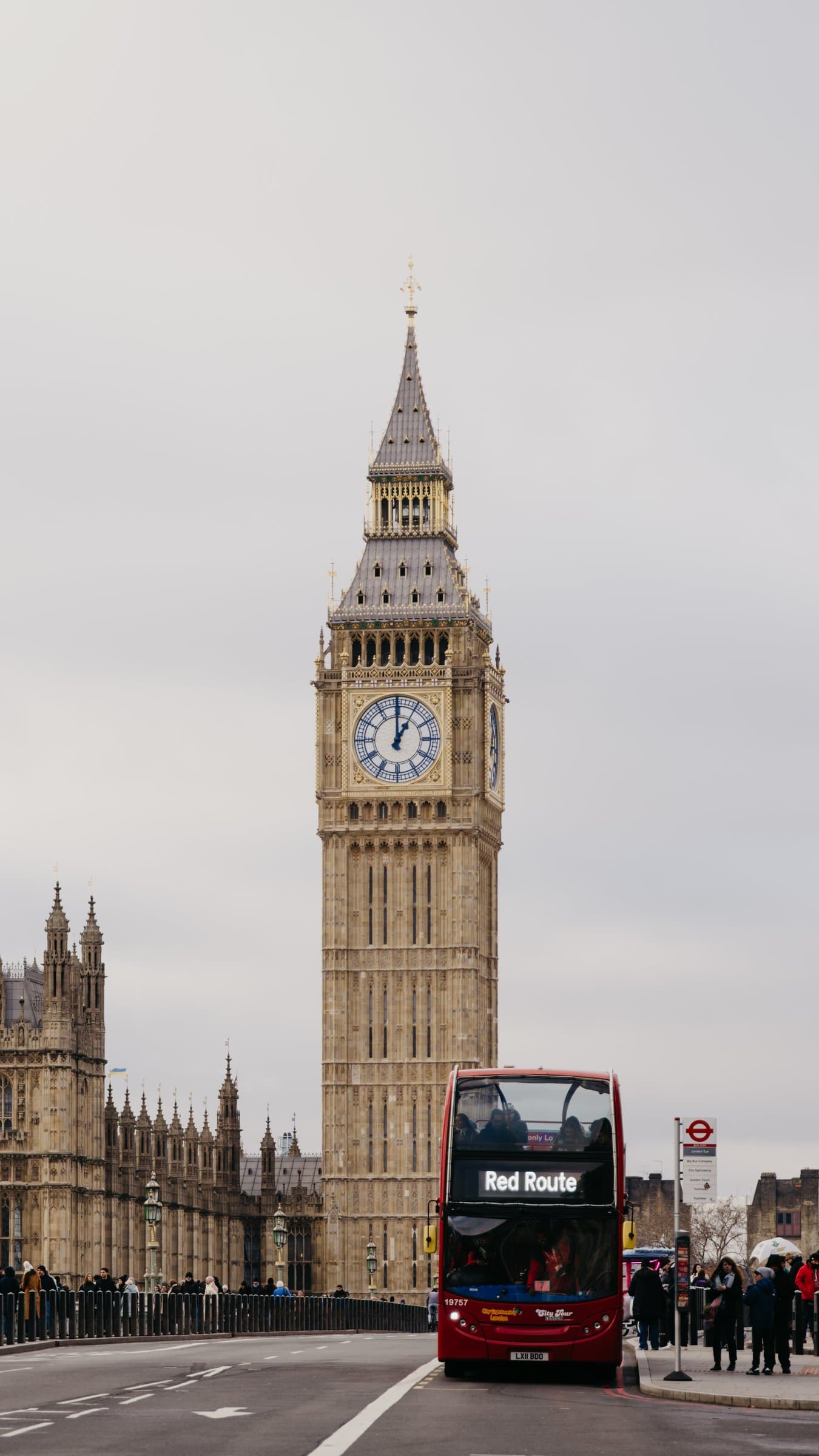 Big Ben and a red bus on Westminster Bridge